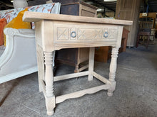 Load image into Gallery viewer, Authentic stripped oak hall table with beautiful natural grain exposed throughout. Features a single dovetail-jointed drawer offering practical storage for hallway essentials. The wood displays genuine character with minor surface marks that enhance its rustic appeal. Bare wood finish allows you to customize with your choice of wax, oil, or stain to suit your décor. A versatile piece that works equally well as a console table, entryway focal point, or compact desk.
Delivery Available
Overall Dimensions
8