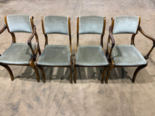 Load image into Gallery viewer, Elevate your dining space with this charming quartet of Edwardian-inspired chairs. Featuring two elegant upright designs paired with two generously proportioned carver chairs, this set brings timeless sophistication to any table. Dressed in a rich green upholstery, each piece boasts solid structural integrity and good overall condition. Minor surface marks on the fabric are present but should come out.
Delivery Available
Overall Dimensions
carvers approx : 51cm wide x 43cm deep x 81cm high
