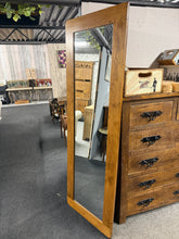 Load image into Gallery viewer, Crafted from oak, this mirror is originally from Oak Furniture Land. Its solid construction ensures durability, while the natural finish complements rustic, traditional, and contemporary interiors alike. Minor surface marks add to its authentic appeal. An ideal statement piece for hallways, bedrooms, or living spaces seeking timeless elegance.
Delivery Available
Overall Dimensions
60cm wide x 180cm high \