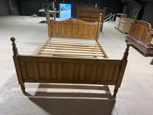 Load image into Gallery viewer, Solid pine kingsize bed in good structural condition. This used piece shows character with minor surface marks that can easily be refreshed with polish or paint. Sturdy construction, accommodates a 5ft mattress. A reliable choice for those seeking authentic pine furniture with character and practicality.
Delivery Available
Overall Dimensions
161cm wide x 212cm long
headboard height : 116cm
footboard height : 94cm