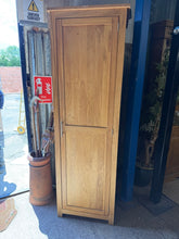 Load image into Gallery viewer, A practical single oak wardrobe with solid construction and reliable storage. This pre-loved piece features a hanging rail and shelf, perfect for organising clothes and accessories. Shows honest signs of use including surface marks and a minor crack at the bottom right of the door—cosmetic only and doesn't affect functionality. Ideal for those seeking authentic character with everyday utility.
Delivery Available
Overall Dimensions
61cm wide x 58cm deep x 190cm high