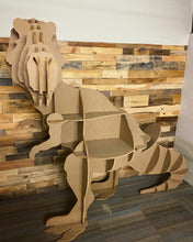 Load image into Gallery viewer, Say hello to TREVOR our T-Rex friend. Our prehistoric pal is guaranteed to be centre of attention in any room. He (or she) is made from 12mm MDF so is very heavy and sturdy. Trevor is a desk believe it or not but also doubles up as a bookcase.  This T-Rex isn't just a looker - he's a multi-tasker too! Whether you want to store books, papers and other items on his back or use him as a desk to get all your work done, Trevor is your one-stop-dino shop.  Comes flat pack with easy to assemble instructions.