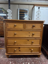 Load image into Gallery viewer, A charming vintage pine chest featuring authentic dovetail joinery and generous storage. This well-loved piece is structurally sound with character marks that reflect its age and history. The layout comprises two short drawers over three deeper drawers, ideal for bedroom or hallway use. A beautiful addition to any home with period appeal.
Delivery Available
Overall Dimensions
98cm wide x 50cm deep x 100cm high