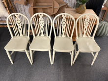 Load image into Gallery viewer, A charming set of four wheel back dining chairs, each with solid structural integrity and authentic vintage character. Minor wear and distressing enhance their rustic appeal, making them ideal for creating a characterful dining space with period charm and practical seating for four.
Delivery Available
Overall Dimensions
approx : 37cm wide x 47cm deep x 87.5cm high