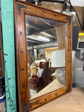 Load image into Gallery viewer, This Indian sheesham rosewood mirror combines timeless elegance with solid construction. Crafted from rosewood, it showcases authentic character with gentle patina marks that enhance its vintage appeal. Structurally sound and ready to make a striking statement in any room, this piece brings warmth and sophistication to your home.
Delivery Available
Overall Dimensions
66cm x 91cm