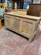 Load image into Gallery viewer, A striking solid oak blanket box, stripped to reveal its natural grain and character. Originally converted by previous owners—the lid is fixed, with each front panel operating as an individual door, concealing shelves within. The bare wood finish invites personalisation with wax or oil for added protection and patina. A distinctive, conversation-starting piece that commands attention in any interior.
Delivery Available
Overall Dimensions
118.5cm wide x 51.5cm deep x 69cm high