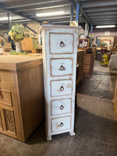 Load image into Gallery viewer, A charming wooden tall chest of drawers in structurally sound condition. Hand-painted with a crisp white finish and distressed for vintage character. Features five spacious drawers ideal for bedroom storage or hallway display. A striking statement piece that brings warmth and personality to any room.
Delivery Available
Overall Dimensions
36cm wide x 27cm deep x 119cm high
