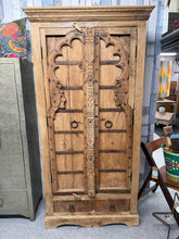 Load image into Gallery viewer, This beautiful hardwood Indian cupboard is sturdy and generally in great shape. It shows some minor marks, but nothing significant. Featuring three hardwood shelves inside, it's ideal as a linen cupboard or larder. Please note, it’s quite heavy and cannot be taken apart.
Overall Dimensions
91cm wide x 46cm deep x 181cm high
DELIVERY AVAILABLE
For our other items see our website https://fossewayfurniture.co.uk
collection from our shop at cv36, our collection zone at bs36 or otherwise delivery is a