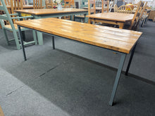 Load image into Gallery viewer, A striking industrial dining table that combines authentic character with practical functionality. Featuring a robust planked top, this piece is ready to become the centrepiece of your dining space. With minor surface marks that can be easily restored through light sanding, it retains genuine vintage appeal. Comfortably accommodates six diners, making it ideal for family gatherings and entertaining guests.
Overall Dimensions
175cm long x 80cm wide x 70.5cm high
DELIVERY AVAILABLE
For our other ite