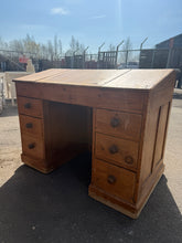 Load image into Gallery viewer, This 19th century antique pine desk is not only aesthetically pleasing, but also in good condition for its age. Its sloped front and hinged center reveal a well-maintained interior with five pigeon holes, while the kneehole is flanked by two sets of three dovetail jointed drawers.
Overall Dimensions
121cm wide x 66cm deep x 92cm high
DELIVERY AVAILABLE    
For our other items see our website https://fossewayfurniture.co.uk
collection from cv36 or delivery available