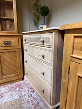 Load image into Gallery viewer, A characterful stripped oak chest with authentic period appeal. Four spacious dovetail-jointed drawers provide generous storage, whilst the natural wood finish showcases the grain beautifully. Recently stripped back to bare wood, it's ready for your chosen finish—a protective wax coat is recommended. Minor cosmetic wear to one side adds to its vintage charm and doesn't impact functionality. Perfect for period homes or those seeking genuine reclaimed character.
Delivery Available
Overall Dimensions
81cm w