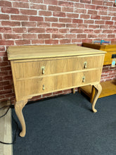 Load image into Gallery viewer, This charming mahogany hall table has been fully stripped to showcase its natural beauty and could be enhanced with a protective wax finish. While there is minor damage on one side, it doesn’t impact its functionality. It includes two long drawers with dovetail joints, offering ample storage space.
Overall Dimensions
92cm wide x 53.5cm deep x 78cm high
DELIVERY AVAILABLE
For our other items see our website https://fossewayfurniture.co.uk
collection from our shop at cv36, our collection zone at bs