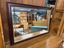 Load image into Gallery viewer, Discover the timeless elegance of this mahogany-framed mirror with its distinctive bevelled edges. Its structurally sound, this cherished piece showcases gentle signs of use that only enhance its authentic character. A delightful addition to any interior seeking classic sophistication and warmth.
Delivery Available
Overall Dimensions
98cm wide x 67cm high 