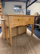 Load image into Gallery viewer, A characterful oak console table with solid construction. Featuring two dovetail-jointed drawers for practical storage, this well-maintained piece brings timeless elegance to any room. Ready to display as-is or customise to suit your style.
Delivery Available
Overall Dimensions
100cm wide x 40.5cm deep x 80.5cm high 