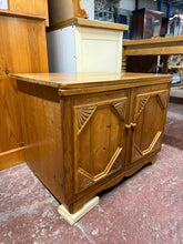 Load image into Gallery viewer, A charming solid pine cupboard with timeless appeal. This low-profile piece features a double-door design with internal shelf storage, perfect for hallways, kitchens, or living spaces. It combines vintage character with practical functionality. Structurally sound and in overall good condition with only a few minor marks.
Delivery Available
Overall Dimensions
70cm wide x 49cm deep x 53cm deep