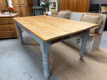 Load image into Gallery viewer, This stunning large antique pine dining table is structurally sound and in overall good condition for its age. It has been painted by its previous owners so may need a touch up. It has 2 drawers at the front for storage. The top can come off for easier moving, but still leaves legs and frame as one.
Overall Dimensions
104cm wide x 185cm long x 77cm high
DELIVERY AVAILABLE    
For our other items see our website https://fossewayfurniture.co.uk
collection from cv36 or bs36