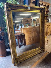 Load image into Gallery viewer, This stunning large ornate mirror is structurally sound and in great condition for its age. It does have a few marks but nothing that affects its use. Whilst the frame is old the mirror is not.
Overall Dimensions
151cm x 121cm
frame thickness ranges from 12cm thick to 16cm
DELIVERY AVAILABLE    
For our other items see our website https://fossewayfurniture.co.uk
collection from cv36 or bs36