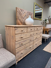Load image into Gallery viewer, A spacious stripped pine chest offering generous storage across ten drawers—four shallow and six deep. The natural wood finish showcases authentic grain and character, ready for your choice of protective treatment. Ideal for bedrooms, hallways, or any room requiring substantial, organised storage.
Delivery Available
Overall Dimensions
158cm wide x 38cm deep x 90cm high
