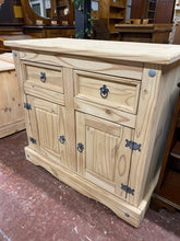 Load image into Gallery viewer, This solid pine sideboard has been completely stripped back to its natural state. It has ample storage with 2 short drawers over a double cupboard with 1 shelf in. It is structurally sound and in great condition.
Overall Dimensions
91.5cm wide x 44cm deep x 84cm high
DELIVERY AVAILABLE
For our other items see our website https://fossewayfurniture.co.uk
collection form cv36 or bs36