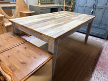 Load image into Gallery viewer, A characterful dining table with authentic grey distressed legs and solid woodblock construction. Seats six comfortably. The detachable legs make transport and repositioning straightforward. This pre-loved piece bears gentle signs of use that add to its rustic charm—no significant damage. Perfect for those seeking vintage character with practical functionality.

Delivery Available

Overall Dimensions

160cm long x 90cm wide x 76.5cm high

