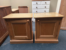 Load image into Gallery viewer, A practical pair of bedside tables in solid working order, showing natural signs of use. One unit requires the top to be reattached, though this won't impact functionality once in place. Both feature removable glass tops and internal shelving for convenient storage. Ideal for those seeking affordable, functional bedroom furniture with character.

Delivery Available

Overall Dimensions

58cm wide x 41.5cm deep x 67cm high&nbsp;

