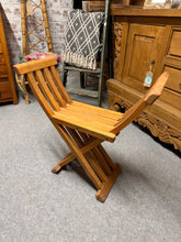 Load image into Gallery viewer, A practical teak stool that's built to last. This piece shows its age with minor surface marks and signs of use, but remains structurally solid and fully functional.

Delivery Available

Overall Dimensions

60cm wide x 23cm deep x 61cm high

