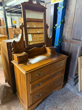 Load image into Gallery viewer, This beautiful satinwood vanity unit is sturdy and well-maintained. While it shows some signs of use, the marks are minor and do not detract from its charm. It features three spacious dovetail jointed drawers plus two smaller drawers beside the mirror, offering plenty of storage.

Overall Dimensions

91cm wide x 42cm deep x 165cm to the top of the mirror

DELIVERY AVAILABLE      

For our other items see our website https://fossewayfurniture.co.uk

collection from our shop at cv36, our collection zone at bs
