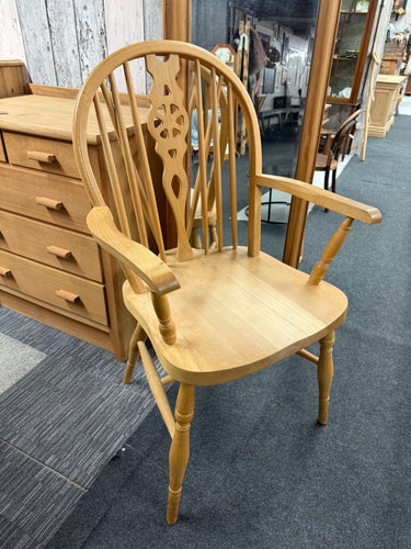 This beautiful solid pine wheel-back carver is sturdy and well-maintained. It shows some signs of use, but only minor marks that don’t detract from its charm. Ideal for a cozy bedroom chair or to complete your dining table setup.

Delivery Available

Overall Dimensions

approx : 55cm wide x 49cm deep x 92cm high      
