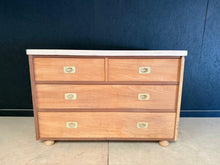 Load image into Gallery viewer, Vintage Campaign Style Chest of Drawers with authentic character. Structurally sound and fully functional, featuring two short dovetail-jointed drawers above two generous long drawers for ample storage. The piece displays natural patina and minor surface marks including a small crack to one side—testament to its age and heritage. Stripped wood finish ready for your chosen wax or stain. A distinctive addition to period or eclectic interiors.

Delivery Available

Overall Dimensions

119.5cm wide x 50.5cm deep
