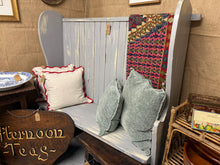 Load image into Gallery viewer, This striking grey distressed 19th century settle is solid in construction and great condition. Its weathered finish and traditional design make it an ideal focal point for hallways, boot rooms, or period-inspired interiors. A versatile statement piece that blends heritage charm with practical seating.

Delivery Available

Overall Dimensions

138cm wide x 49cm deep x 137cm high

