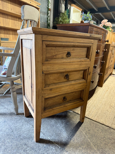This charming rustic pine chest of drawers brings warmth and character to any room. Crafted from solid pine, it offers sturdy construction and reliable durability. Featuring three spacious drawers, it provides ample storage for clothes, linens, or everyday essentials. While it shows some gentle signs of use, these marks add to its authentic, lived-in appeal without compromising its overall good condition.

Overall Dimensions

60.5cm wide x 42cm deep x 90cm high

DELIVERY AVAILABLE      

For our other items