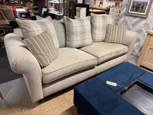 Load image into Gallery viewer, The DFS Morland 4 seater sofa combines comfort with practicality. Featuring five large duck feather-filled cushions in plaid and grey tones, plus two smaller brown striped cushions, this piece offers versatile styling options. Removable, washable cushion covers make maintenance effortless. Structurally sound in good condition, the sofa shows minor wear that would be sorted with a clean.

Delivery Available

Overall Dimensions

approx : 237cm wide x 103cm deep x 80/95cm high&nbsp;

