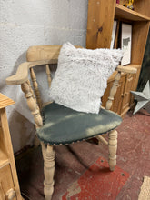Load image into Gallery viewer, Vintage captain's chair with stripped natural finish. This characterful piece showcases genuine patina and wear, reflecting its history. The bare wood benefits from protective wax treatment. A tinted leather wax will deepen the aesthetic of the seat and provide conditioning. Ideal for those seeking genuine vintage charm with character and soul.

Delivery Available

Overall Dimensions

approx : 68cm wide x 47cm deep x 82cm high

