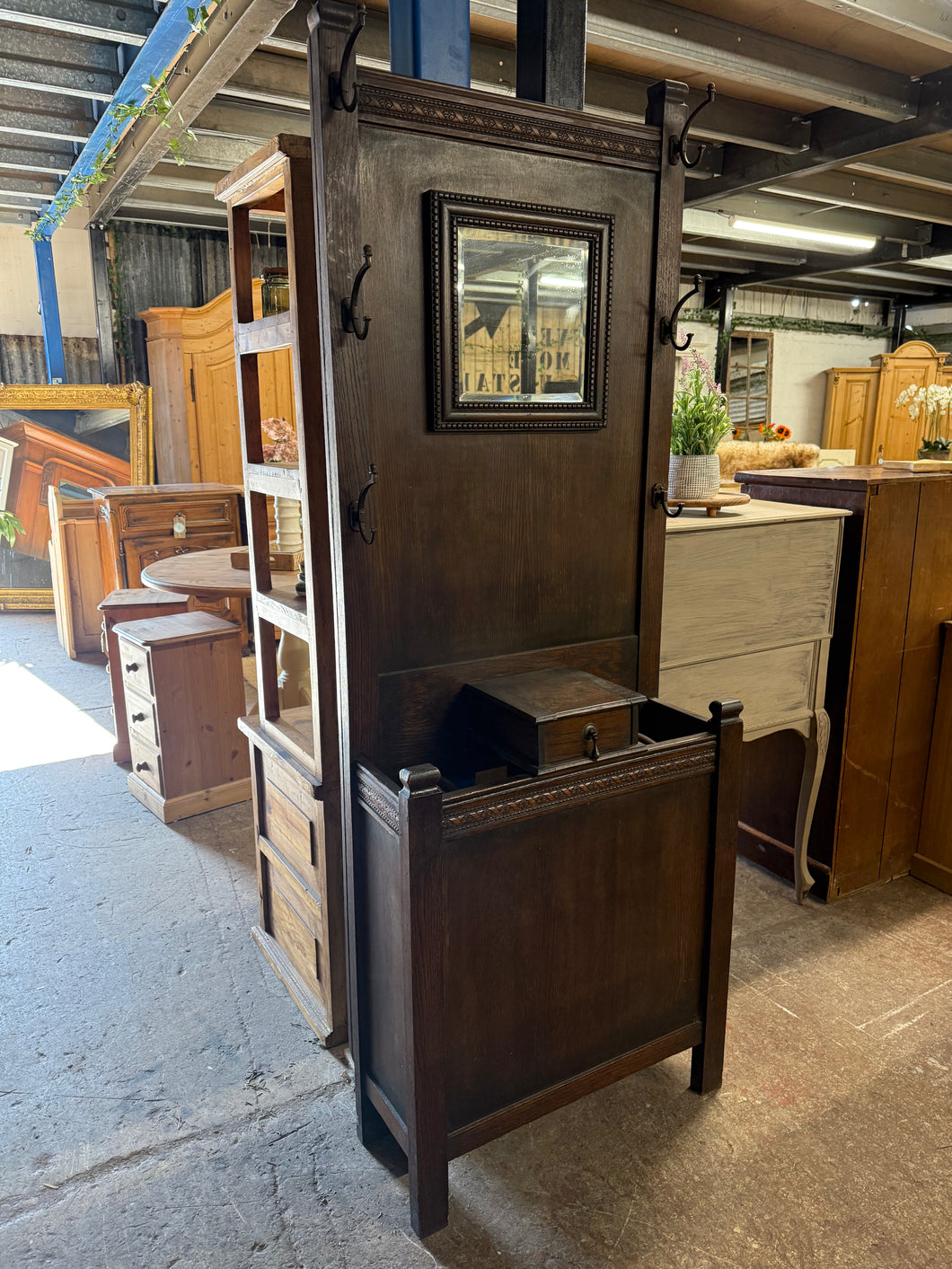 This sturdy oak hall stand is in good condition and includes 6 hooks and a small storage drawer. While it may show signs of use, such as minor marks and a broken hook, these flaws are not significant. The stand offers plenty of storage space for items like umbrellas, making it practical and functional.

Overall Dimensions

68cm wide x 28cm deep x 188cm high

DELIVERY AVAILABLE    

HAVE THIS PAINTED A COLOUR OF YOUR CHOICE FOR AN EXTRA £70 OR COMPLETELY STRIPPED BACK FOR £80 

For our other items see our we