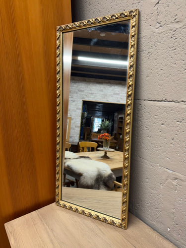 This beautiful gold-framed mirror is sturdy and in great overall condition. It shows some minor signs of use but nothing significant. A hanging chain is attached to the back for easy display.

Delivery Available

Overall Dimensions

35cm wide x 80.5cm high
