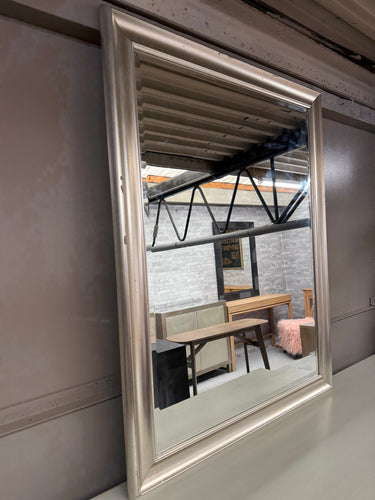 Brighten your space with this charming silver-framed mirror, complete with a lovely bevelled edge that adds classic elegance. Sturdy, this gently used mirror shows just the right amount of patina—proof of its enduring quality. 

Delivery Available

Overall Dimensions

91cm x 116.5cm        
