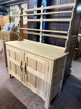 Load image into Gallery viewer, This beautiful Ercol dresser has been fully restored to its natural finish and might benefit from a wax coat to keep it protected. There are minor marks on the top corner, but they are not significant. It offers plenty of storage space, featuring two shelves in the upper section and a double cupboard at the bottom. Plus, it separates into two parts for easier transport.

Overall Dimensions

123cm wide x 47cm deep x 151cm high

DELIVERY AVAILABLE      

For our other items see our website https://fossewayfur
