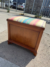 Load image into Gallery viewer, This charming wooden storage seat is sturdy and well-maintained. While it shows some signs of use, the marks are minor and add character. The lid opens easily to reveal plenty of storage space inside.

Overall Dimensions

56cm wide x 41cm deep x 50cm high

DELIVERY AVAILABLE      

For our other items see our website https://fossewayfurniture.co.uk

collection from our shop at cv36, our collection zone at bs36 or otherwise delivery is available

