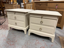 Load image into Gallery viewer, These elegant bedside tables feature Farrow and Ball's Oxford Stone finish, delivering a sophisticated neutral aesthetic to any bedroom. Each unit is equipped with a convenient pull-out tray and two dovetail-jointed drawers for practical storage. Well-maintained and structurally robust, these Stag pieces offer timeless style with reliable functionality.

Delivery Available

Overall Dimensions

53cm wide x 46.5cm deep x 51.5cm high

