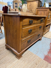 Load image into Gallery viewer, This elegant Victorian satinwood chest of drawers combines timeless craftsmanship with practical storage. Featuring a traditional layout of two short dovetail-jointed drawers above two spacious long drawers, it offers versatile organisation for any room. The piece is structurally sound with minor surface marks that add to its authentic character. A distinguished vintage addition for those who appreciate quality furniture with genuine period appeal.

Delivery Available

Overall Dimensions

110cm wide x 48cm 
