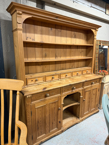 This elegant dresser is made of vintage pine and is in good condition with sturdy construction. Although it shows some marks of previous use, these only enhance its appeal. The top section features 2 fixed shelves and 5 short drawers, while the bottom section has 3 dovetail jointed drawers and 2 cupboards, providing ample storage space. The piece can be separated into 2 parts for easier transportation.

Overall Dimensions

179.5cm wide x 50cm deep x 197cm high

DELIVERY AVAILABLE      

For our other items 