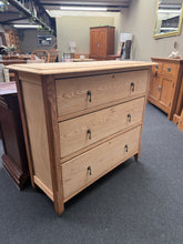 Load image into Gallery viewer, A versatile beech chest of drawers stripped to bare wood, showcasing natural grain and colour variation. Three deep drawers with traditional dovetail joinery offer ample storage space. The unfinished surface allows you to customise the look with your choice of stain or wax—a protective finish is advisable for everyday use. Structurally sound and well-crafted, this piece suits both period properties and contemporary interiors seeking authentic wooden furniture.

Delivery Available

Overall Dimensions

98cm w
