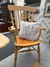 Load image into Gallery viewer, A charming solid pine grandfather chair with authentic character. Structurally sound and in good overall condition, this vintage piece bears the gentle marks of age and use—adding to its rustic appeal. Ideal for a cosy fireside spot or welcoming hallway corner. A timeless addition to any home with traditional charm.

Delivery Available

Overall Dimensions

approx : 63cm wide x 47cm deep x 115cm high

