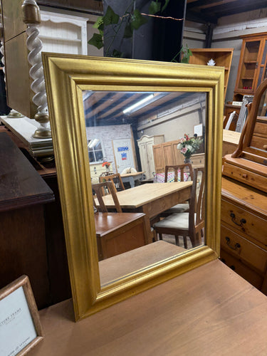 This charming small mirror features a sturdy gold frame and is in great overall shape. It shows some minor signs of use but nothing significant. A convenient string on the back makes hanging simple and hassle-free.

Delivery Available

Overall Dimensions

53cm wide x 63.5cm high

Split the cost over 3 months with KLARNA when you spend £50 or more          

All our items are second hand so may have a few marks,knocks ,chips etc that aren't clearly seen in the photos.

Please note that not all items are avai