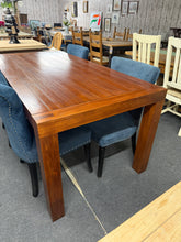Load image into Gallery viewer, This oak effect dining table offers solid construction and reliable performance for everyday use. Displaying natural wear with only minor cosmetic marks, it remains in good working order. Accommodates 6-8 seated guests with ease, making it suitable for family meals and social occasions. Detachable legs simplify moving and repositioning, adding practical flexibility to your dining space.

Delivery Available

Overall Dimensions

180cm long x 90cm wide x 78cm high&nbsp;

