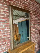 Load image into Gallery viewer, This charming industrial-style mirror with a bevelled edge is solidly built and in good overall shape. As a pre-loved piece, it shows some minor signs of use, but nothing significant.

Delivery Available

Overall Dimensions

77cm wide x 108cm high

