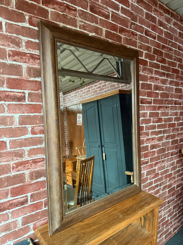 This charming industrial-style mirror with a bevelled edge is solidly built and in good overall shape. As a pre-loved piece, it shows some minor signs of use, but nothing significant.

Delivery Available

Overall Dimensions

77cm wide x 108cm high
