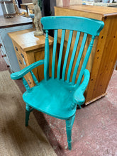 Load image into Gallery viewer, A charming blue painted grandfather chair with authentic vintage character. Structurally robust and well-maintained, this piece bears the gentle marks of age—minor chips that enhance its vintage charm rather than detract from it. Ideal positioned by the fireplace or as a distinctive accent in any room, it combines timeless elegance with practical comfort.&nbsp;

Delivery Available

Overall Dimensions

approx : 65cm wide x 45cm deep x 103cm high
