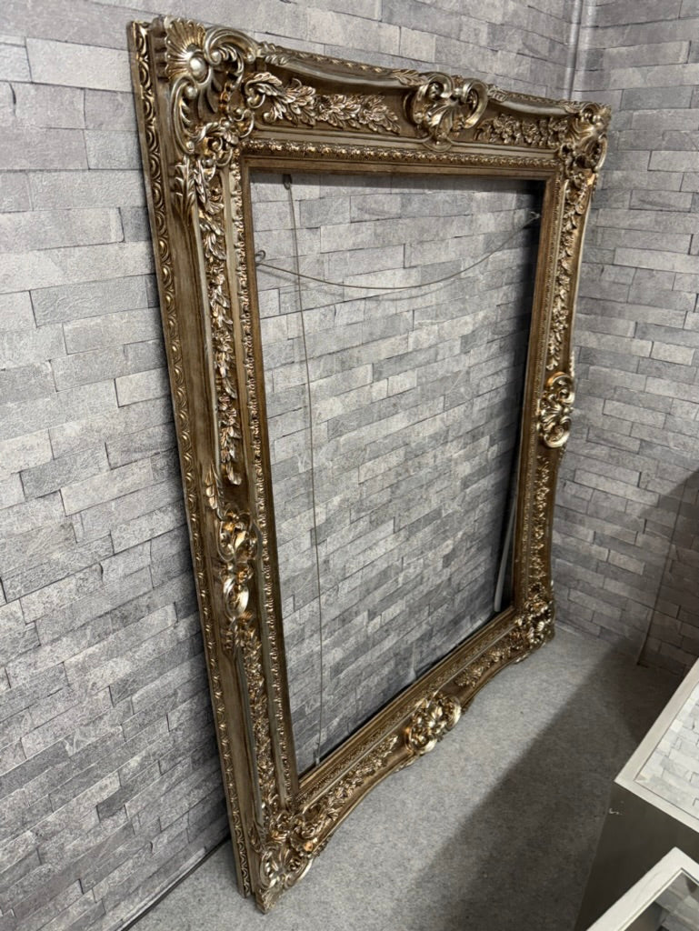 A charming frame brimming with character and vintage appeal! Solidly constructed and well-preserved, this beauty is primed for its next chapter. Whether you're displaying a cherished photograph or a decorative mirror, it's ready to showcase your treasures with timeless elegance and warmth.

Delivery Available

Overall Dimensions

124cm x 154cm        
