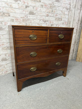 Load image into Gallery viewer, This mahogany chest combines practical storage with classic craftsmanship. Featuring two short dovetail-jointed drawers above two long drawers, it offers versatile organisation for any room. The piece is structurally solid and fully functional. As a pre-loved item, it bears the honest patina of age—including surface marks and some veneer loss. Ideal for those who appreciate authentic vintage furniture with genuine history.

Delivery Available

Overall Dimensions

91cm wide x 47cm deep x 89cm high

